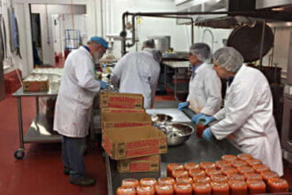 Food to Share volunteers prepare meals for food banks and other PEC locations